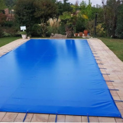 Toldo protector de invierno para piscinas con fijación a la superficie de la piscina